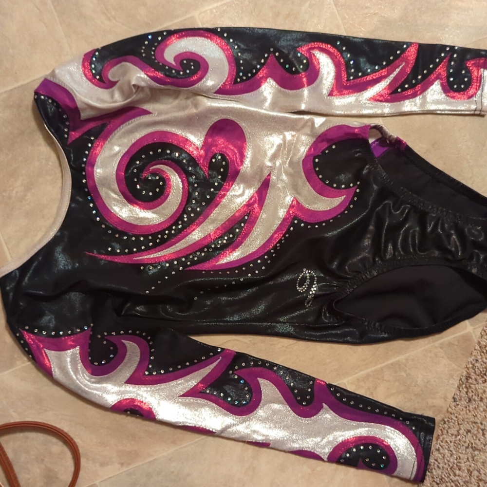 Girls gymnastic dance leotard with diamonds was bought for a solo was never worn